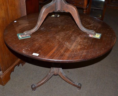 Lot 554 - A 19th century mahogany tripod occasional table