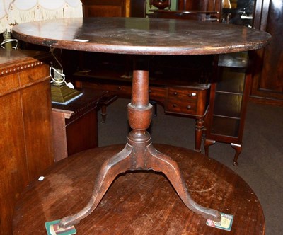 Lot 555 - A 19th century mahogany tripod occasional table