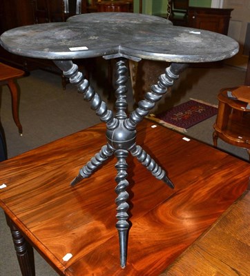 Lot 561 - Ebonised gypsy occasional table with painted floral decoration