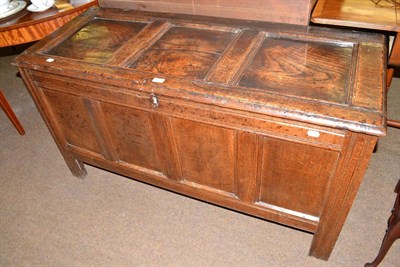 Lot 575 - An 18th century panelled oak blanket chest