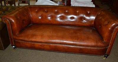 Lot 590 - Brown leather upholstered Chesterfield settee