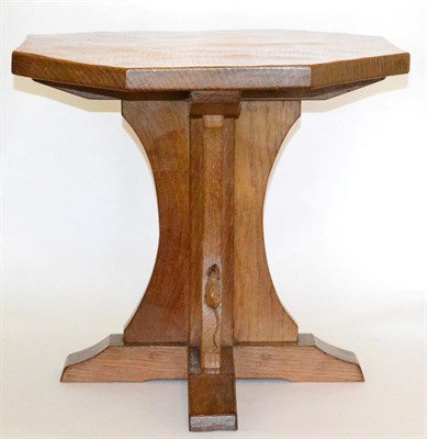 Lot 597 - A Robert  "Mouseman " Thompson Octagonal Oak Coffee Table, on a cruciform base, with carved...