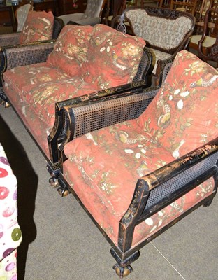 Lot 596 - Early 20th century black lacquered bergere suite with chinoiserie decoration