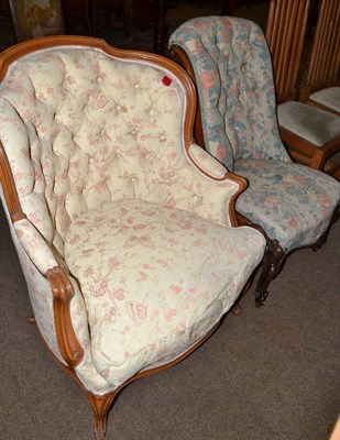 Lot 604 - Victorian mahogany framed nursing chair with button back upholstery and a French style armchair