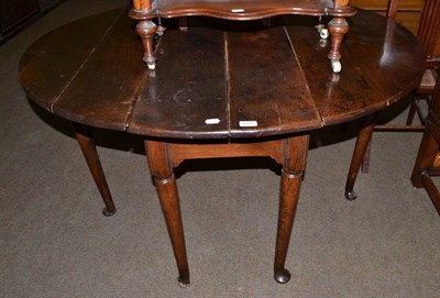 Lot 612 - A 17th/18th century oak pad foot gateleg table