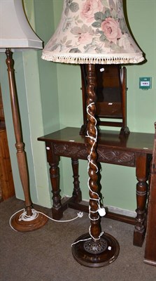 Lot 634 - Reproduction carved oak side table with single drawer, toilet mirror and two standard lamps and...