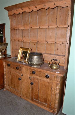 Lot 635 - A 19th century pine dresser and rack