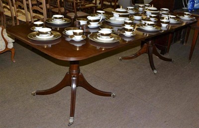 Lot 643 - A Regency style mahogany dining table