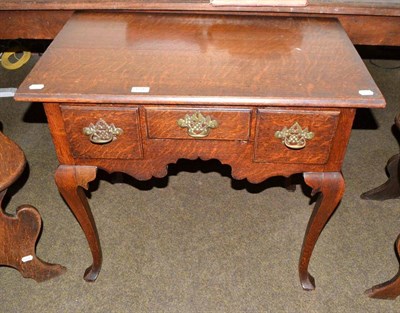 Lot 654 - Georgian style oak lowboy