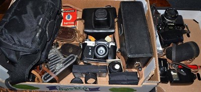 Lot 664 - A collection of cameras and photographs