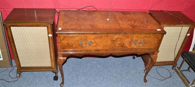 Lot 667 - Dynatron radiogram in a walnut case and two speakers