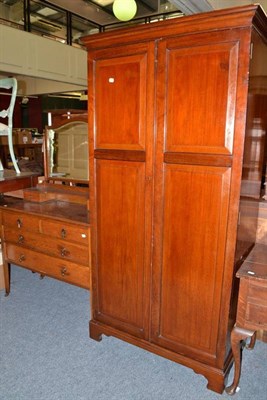 Lot 677 - An oak lowboy, mahogany double wardrobe, oak dressing table and a cut-down table with mahogany top