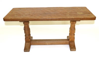 Lot 605 - A Robert  "Mouseman " Thompson 3ft Oak Coffee Table, the adzed rectangular top on octagonal...