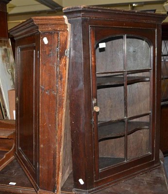 Lot 682 - A 19th century oak corner cabinet and another with glazed door