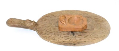 Lot 606 - A Robert  "Mouseman " Thompson Oak Cheese Board, with carved mouse signature on the handle, 38.5cm