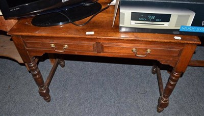 Lot 693 - A two drawer side table