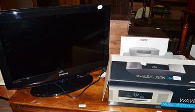 Lot 694 - Samsung flat screen TV and Bose music system