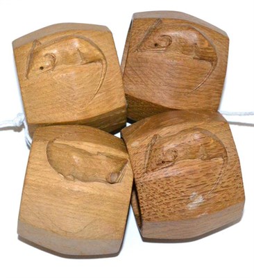 Lot 607 - Four Robert  "Mouseman " Thompson Oak Napkin Rings, each with carved mouse signature, 5cm