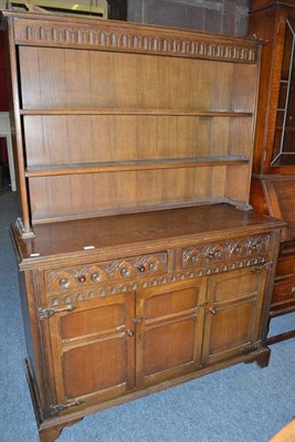 Lot 698 - A 20th century oak dresser and rack