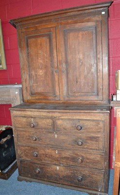 Lot 717 - A 19th century oak and mahogany cross-banded kitchen press and a wheel barometer (2)