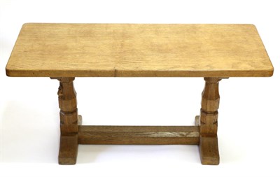 Lot 612 - A Robert  "Mouseman " Thompson 3ft Oak Coffee Table, the rectangular top on two octagonal legs...