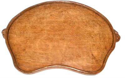 Lot 614 - A Robert  "Mouseman " Thompson Kidney Shaped Oak Tea Tray, with two carved mice handles, 48cm