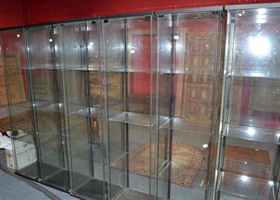 Lot 773 - Six glass cabinets with shelving