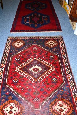 Lot 775 - Kashgai rug, South West Persia, the stepped lozenge field with hooked medallion framed by spandrels