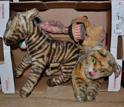 Lot 802 - Steiff tiger, a Reindeer Products zebra and a Steiff Bambi, two puppets and boxed jigsaw