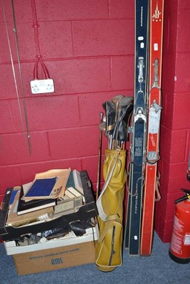 Lot 812 - Assorted ice skates, a silver mounted riding crop, assorted golf clubs and two pairs of wooden...