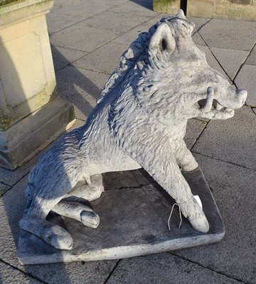 Lot 825 - A reconstituted stone wild boar