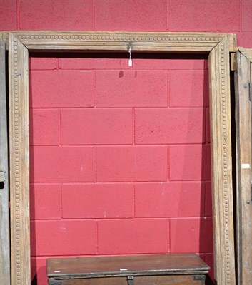 Lot 902 - An 18th century Rajasthan India carved teak door surround in three sections