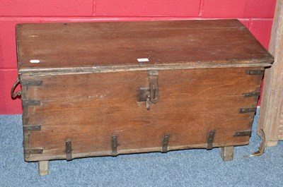 Lot 903 - A Gujarat North Indian teak planked chest, with original iron work strapping