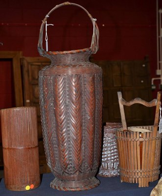 Lot 928 - Group of four 19th century Japanese Ikebana containers, two in classical basketry, one in...