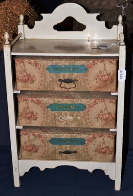 Lot 940 - A French cream painted table top set of drawers, labelled for gloves, lace and handkerchiefs