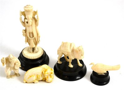Lot 5 - Circa 1930, five ivory figures including a camel on base, an elephant/man on base and a bird on...