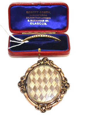 Lot 12 - A seed pearl set crescent brooch and a mourning brooch (boxed)