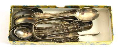 Lot 29 - Twelve teaspoons, six coffee spoons and matching sugar tongs, stamped 'STERLING' (American silver)