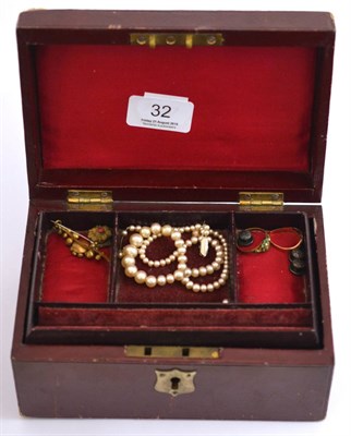 Lot 32 - A curb link bracelet stamped '9', a ring stamped '18CT' and jewellery in a case
