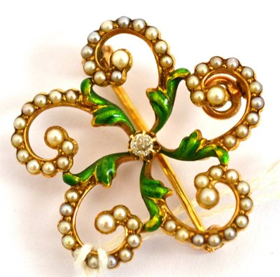 Lot 38 - A diamond, seed pearl and green enamel brooch (cased)