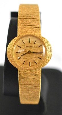 Lot 41 - A lady's 9ct gold wristwatch signed Longines, with Longines box