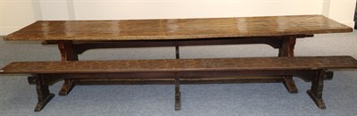 Lot 629 - A Robert  "Mouseman " Thompson Oak 12ft Refectory Table, on two shaped supports, joined by a...