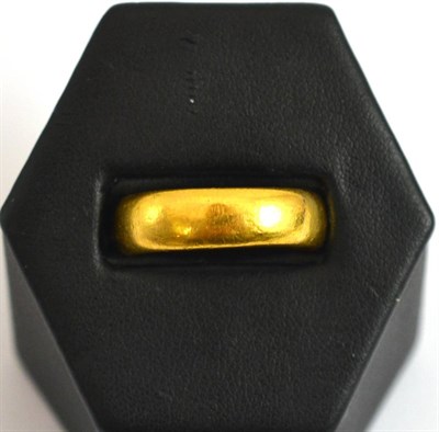 Lot 47 - A 22ct gold band ring, Sheffield 1928
