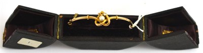 Lot 49 - A bangle, stamped '15' (cased)