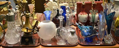 Lot 82 - Three trays including a pair of Royal Dux ewers, a silver mounted scent bottle, assorted decanters