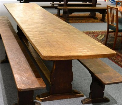 Lot 633 - A Robert  "Mouseman " Thompson Oak 12ft Refectory Table, on two shaped supports, joined by a...