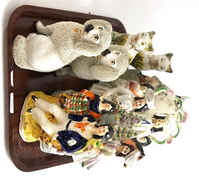 Lot 87 - A tray of assorted Staffordshire flat back figures, a pair of cats and a pair of dogs