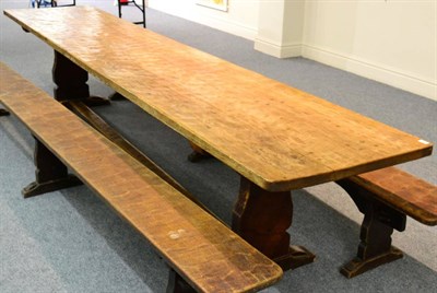 Lot 635 - A Robert  "Mouseman " Thompson Oak 12ft Refectory Table, on two shaped supports, joined by a...