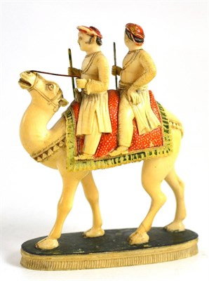 Lot 107 - An Indian ivory group, two men on a camel, circa 1900, 13.5cm high