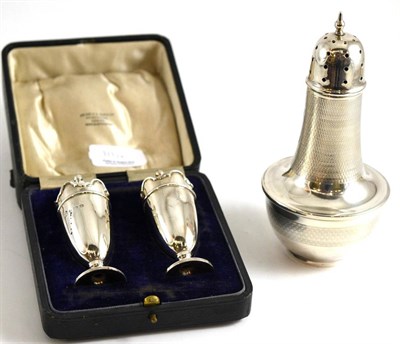 Lot 111 - Silver caster and cased pair of condiments